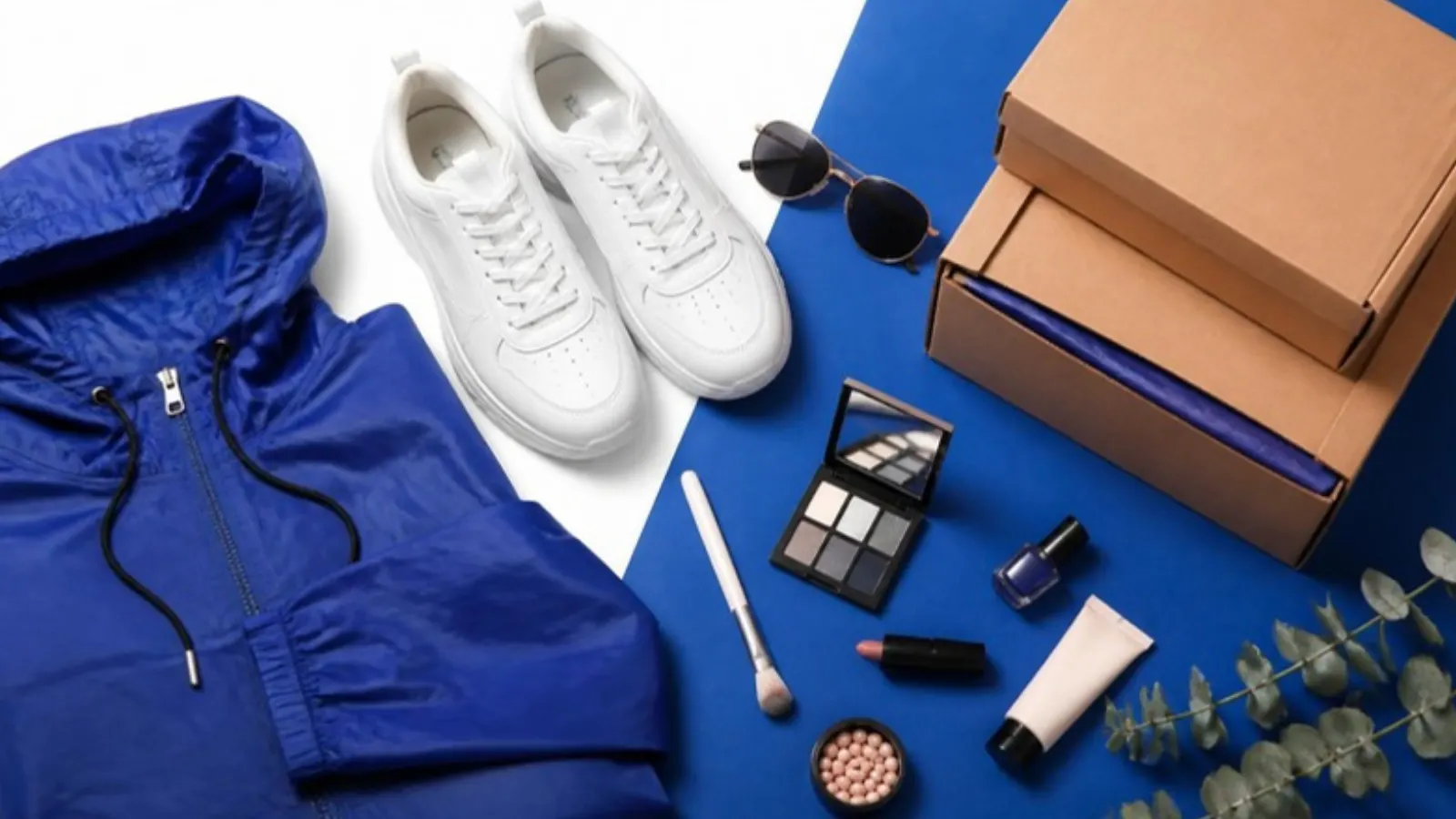 Fashion flat lay with sneakers, hoodie and beauty products